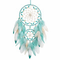 Attrape-rêves turquoise et blanc avec plumes décoratives